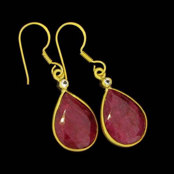 APP: 9k 24kt Gold 18CT Ruby & Sterling Silver Earrings: 24 kt. Gold Overlay, 18.00CT Ruby, And Sterling Silver Earrings - Appraisal Value: $9.2K - Bid with utmost confidence from GovernmentAuction.com. We have been in business for over 35 years, and pride 