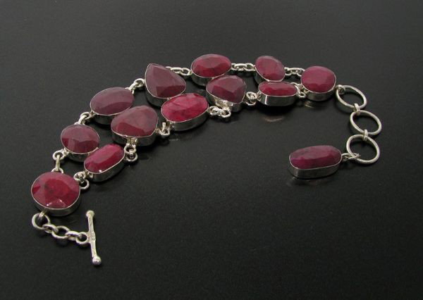 APP: 37.3k 154.72CT Ruby & Sterling Silver Bracelet: 154.72CT Ruby and Sterling Silver Bracelet - Appraisal Value: $37.3K - Bid with utmost confidence from GovernmentAuction.com. We have been in business for over 35 years, and pride ourselves on perfect