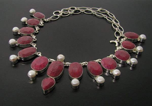 APP: 69.7k 184.17CT Ruby & Sterling Silver Necklace: 184.17CT Ruby and Sterling Silver Necklace - Appraisal Value: $69.7K - Bid with utmost confidence from GovernmentAuction.com. We have been in business for over 35 years, and pride ourselves on perfect