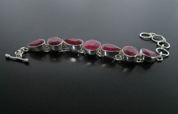 APP: 17.9k 46.40CT Ruby & Sterling Silver Bracelet: 46.40CT Ruby and Sterling Silver Bracelet - Appraisal Value: $17.9K - Bid with utmost confidence from GovernmentAuction.com. We have been in business for over 35 years, and pride ourselves on perfect 