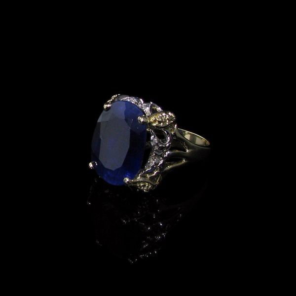 APP: 25k 11CT 14kt Gold, Blue Sapphire & Diamond Ring: 11.82CT 14 kt. Gold, Blue Sapphire and Diamond Ring - Appraisal Value: $25.6K - Bid with utmost confidence from GovernmentAuction.com. We have been in business for over 35 years, and pride ourselves o