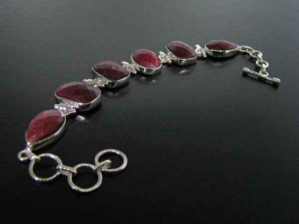 APP: 21.9k 79.07CT Ruby & Sterling Silver Bracelet: 79.07CT Ruby and Sterling Silver Bracelet - Appraisal Value: $21.8K - Bid with utmost confidence from GovernmentAuction.com. We have been in business for over 35 years, and pride ourselves on perfect 