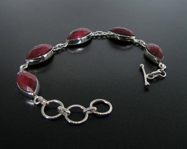APP: 16.1k 58.43CT Ruby & Sterling Silver Bracelet: 58.43CT Ruby and Sterling Silver Bracelet - Appraisal Value: $16.0K - Bid with utmost confidence from GovernmentAuction.com. We have been in business for over 35 years, and pride ourselves on perfect 