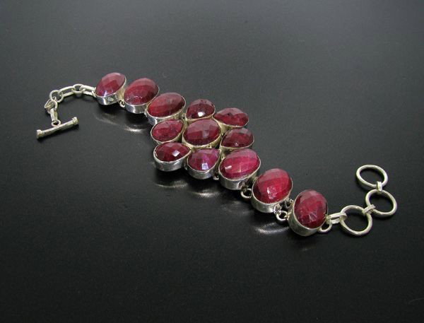 APP: 55.1k 105.13CT Ruby & Sterling Silver Bracelet: 105.13CT Ruby and Sterling Silver Bracelet - Appraisal Value: $55.1K - Bid with utmost confidence from GovernmentAuction.com. We have been in business for over 35 years, and pride ourselves on perfect