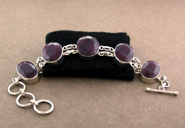APP: 13.3k 56.05CT Ruby & Sterling Silver Bracelet: 56.05CT Ruby and Sterling Silver Bracelet - Appraisal Value: $13.2K - Bid with utmost confidence from GovernmentAuction.com. We have been in business for over 35 years, and pride ourselves on perfect 