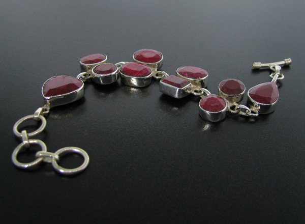 APP: 19.1k 68.89CT Ruby & Sterling Silver Bracelet: 68.89CT Ruby and Sterling Silver Bracelet - Appraisal Value: $19.1K - Bid with utmost confidence from GovernmentAuction.com. We have been in business for over 35 years, and pride ourselves on perfect 
