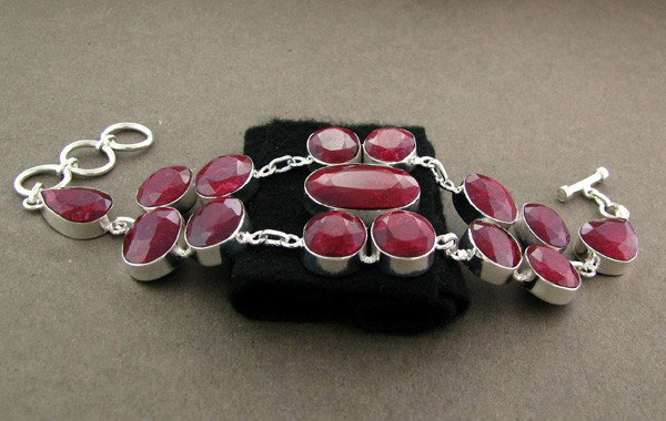 APP: 39k 176.83CT Ruby & Sterling Silver Bracelet: 176.83CT Ruby and Sterling Silver Bracelet - Appraisal Value: $38.9K - Bid with utmost confidence from GovernmentAuction.com. We have been in business for over 35 years, and pride ourselves on perfect