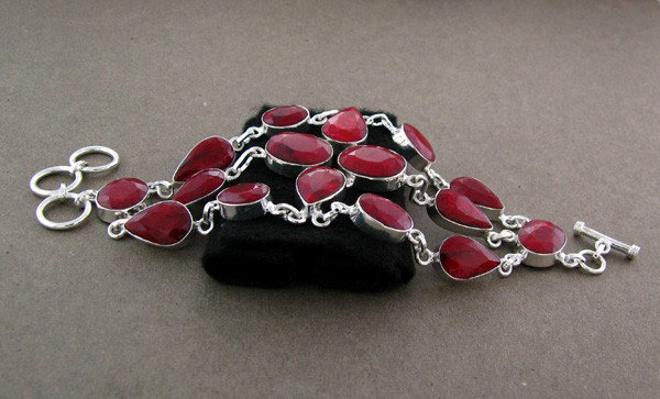 APP: 27.7k 123.63CT Ruby & Sterling Silver Bracelet: 123.63CT Ruby and Sterling Silver Bracelet - Appraisal Value: $27.7K - Bid with utmost confidence from GovernmentAuction.com. We have been in business for over 35 years, and pride ourselves on perfect