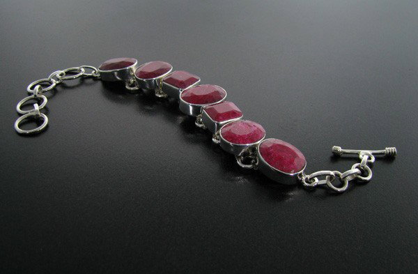 APP: 17.1k 61.33CT Ruby & Sterling Silver Bracelet: 61.33CT Ruby and Sterling Silver Bracelet - Appraisal Value: $17.1K - Bid with utmost confidence from GovernmentAuction.com. We have been in business for over 35 years, and pride ourselves on perfect 