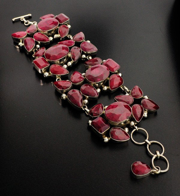 APP: 61.6k 318.38CT Ruby & Sterling Silver Bracelet: 318.38CT Ruby and Sterling Silver Bracelet - Appraisal Value: $61.6K - Bid with utmost confidence from GovernmentAuction.com. We have been in business for over 35 years, and pride ourselves on perfect