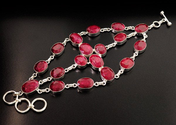 APP: 23k 135.06CT Ruby & Sterling Silver Bracelet: 135.06CT Ruby and Sterling Silver Bracelet - Appraisal Value: $22.9K - Bid with utmost confidence from GovernmentAuction.com. We have been in business for over 35 years, and pride ourselves on perfect