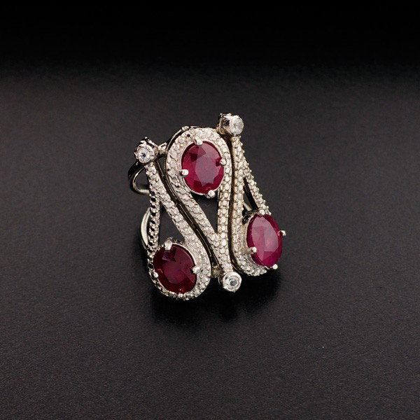 APP: 11k 5CT Ruby & Topaz Platinum Sterling Silver Ring: 5.90CT Ruby and Colorless Topaz Platinum Overlay Sterling Silver Ring - Appraisal Value: $11.5K - Bid with utmost confidence from GovernmentAuction.com. We have been in business for over 35 years, and