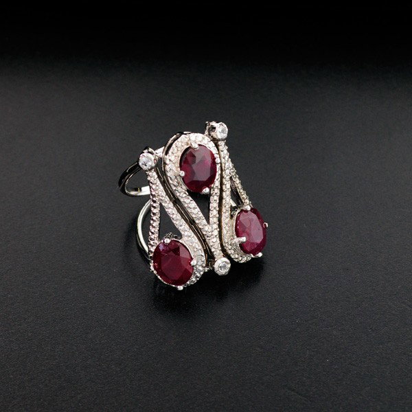 APP: 11k 8CT Ruby & Topaz Platinum Sterling Silver Ring: 8.00CT Ruby and Colorless Topaz Platinum Overlay Sterling Silver Ring - Appraisal Value: $11.2K - Bid with utmost confidence from GovernmentAuction.com. We have been in business for over 35 years, and