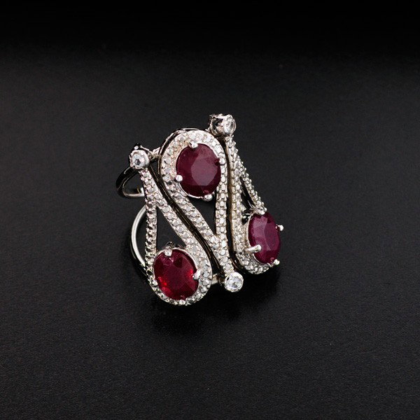 APP: 11k 7CT Ruby & Topaz Platinum Sterling Silver Ring: 7.02CT Ruby and Colorless Topaz Platinum Overlay Sterling Silver Ring - Appraisal Value: $11.2K - Bid with utmost confidence from GovernmentAuction.com. We have been in business for over 35 years, and