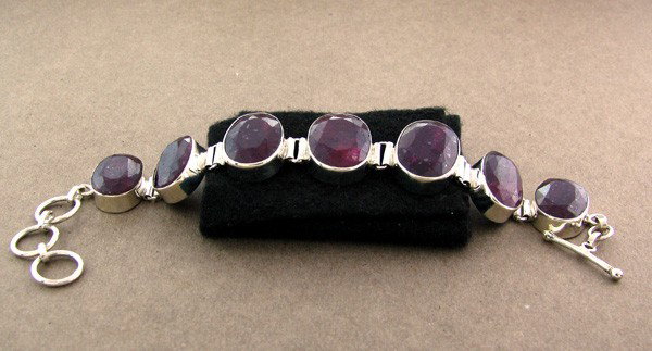 APP: 20.9k 118.03CT Ruby & Sterling Silver Bracelet: 118.03CT Ruby and Sterling Silver Bracelet - Appraisal Value: $20.8K - Bid with utmost confidence from GovernmentAuction.com. We have been in business for over 35 years, and pride ourselves on perfect