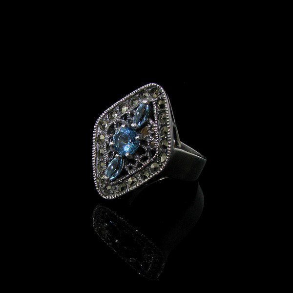 Blue Topaz, Marcasite & Sterling Silver Ring: Blue Topaz, Marcasite and Sterling Silver Ring - Bid with utmost confidence from GovernmentAuction.com. We have been in business for over 35 years, and pride ourselves on perfect customer service.
