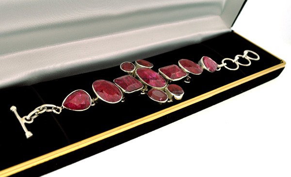 APP: 21.8k 78.84CT Ruby & Sterling Silver Bracelet: 78.84CT Ruby and Sterling Silver Bracelet - Appraisal Value: $21.8K - Bid with utmost confidence from GovernmentAuction.com. We have been in business for over 35 years, and pride ourselves on perfect 