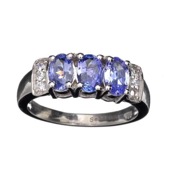 APP: 1.4k 1.11CT Tanzanite And Colorless Quartz Platinum Over Sterling Silver Ring: Gov. File: 91538 1.11CT Tanzanite And Colorless Quartz Platinum Over Sterling Silver Ring Retail Replacement Value: $1.4K Asset Type: Sterling Silver Ring Shipping: $19.95