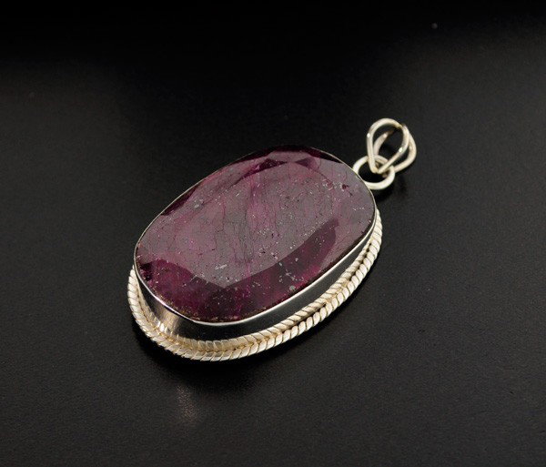 APP: 28.5k 105.76CT Ruby & Sterling Silver Pendant: 105.76CT Ruby and Sterling Silver Pendant - Appraisal Value: $28.5K - Bid with utmost confidence from GovernmentAuction.com. We have been in business for over 35 years, and pride ourselves on perfect 