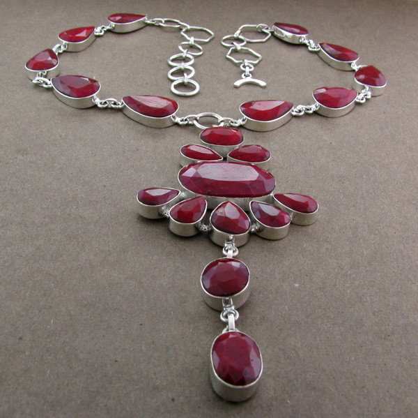 APP: 40.4k 202.43CT Ruby & Sterling Silver Necklace: 202.43CT Ruby and Sterling Silver Necklace - Appraisal Value: $40.4K - Bid with utmost confidence from GovernmentAuction.com. We have been in business for over 35 years, and pride ourselves on perfect