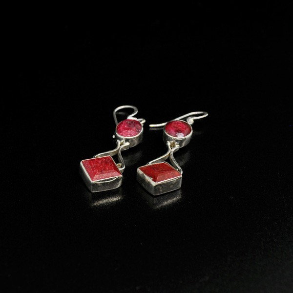APP: 4.4k 9.23CT Ruby & Sterling Silver Earrings: 9.23CT Ruby and Sterling Silver Earrings - Appraisal Value: $4.4K - Bid with utmost confidence from GovernmentAuction.com. We have been in business for over 35 years, and pride ourselves on perfect cu