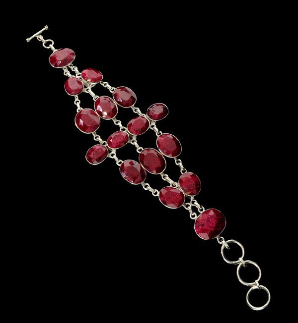 APP: 26.6k 156.87CT Ruby & Sterling Silver Bracelet: 156.87CT Ruby and Sterling Silver Bracelet - Appraisal Value: $26.5K - Bid with utmost confidence from GovernmentAuction.com. We have been in business for over 35 years, and pride ourselves on perfect