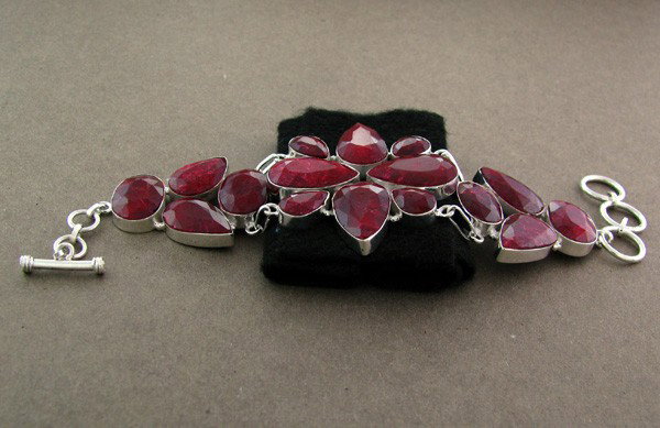 APP: 38.3k 173.20CT Ruby & Sterling Silver Bracelet: 173.20CT Ruby and Sterling Silver Bracelet - Appraisal Value: $38.3K - Bid with utmost confidence from GovernmentAuction.com. We have been in business for over 35 years, and pride ourselves on perfect