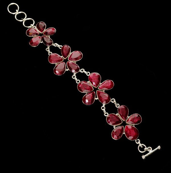 APP: 23k 135.29CT Ruby & Sterling Silver Bracelet: 135.29CT Ruby and Sterling Silver Bracelet - Appraisal Value: $22.9K - Bid with utmost confidence from GovernmentAuction.com. We have been in business for over 35 years, and pride ourselves on perfect