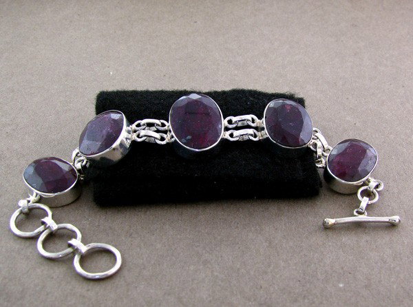 APP: 18.1k 79.00CT Ruby & Sterling Silver Bracelet: 79.00CT Ruby and Sterling Silver Bracelet - Appraisal Value: $18.1K - Bid with utmost confidence from GovernmentAuction.com. We have been in business for over 35 years, and pride ourselves on perfect 
