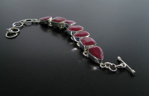 APP: 18.7k 48.57CT Ruby & Sterling Silver Bracelet: 48.57CT Ruby and Sterling Silver Bracelet - Appraisal Value: $18.7K - Bid with utmost confidence from GovernmentAuction.com. We have been in business for over 35 years, and pride ourselves on perfect 