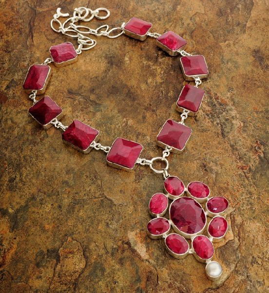 APP: 32k 218.33CT Ruby & Sterling Silver Necklace: 218.33CT Ruby and Sterling Silver Necklace - Appraisal Value: $32.0K - Bid with utmost confidence from GovernmentAuction.com. We have been in business for over 35 years, and pride ourselves on perfect