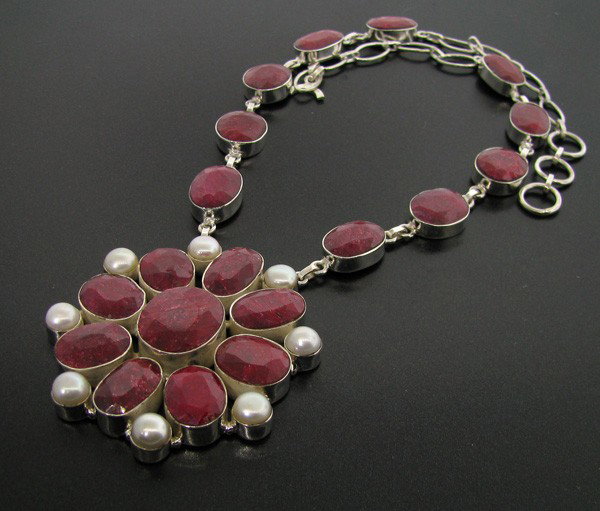 APP: 44.9k 114.87CT Ruby & Sterling Silver Necklace: 114.87CT Ruby and Sterling Silver Necklace - Appraisal Value: $44.8K - Bid with utmost confidence from GovernmentAuction.com. We have been in business for over 35 years, and pride ourselves on perfect