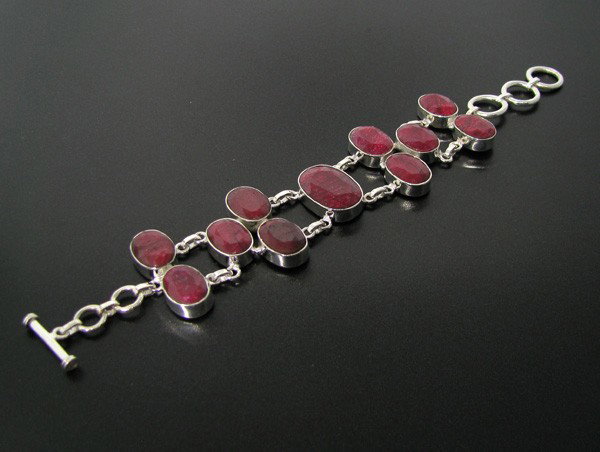 APP: 39k 73.89CT Ruby & Sterling Silver Bracelet: 73.89CT Ruby and Sterling Silver Bracelet - Appraisal Value: $39.0K - Bid with utmost confidence from GovernmentAuction.com. We have been in business for over 35 years, and pride ourselves on perfect 