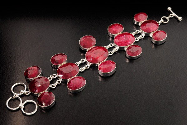 APP: 25.2k 148.16CT Ruby & Sterling Silver Bracelet: 148.16CT Ruby and Sterling Silver Bracelet - Appraisal Value: $25.2K - Bid with utmost confidence from GovernmentAuction.com. We have been in business for over 35 years, and pride ourselves on perfect