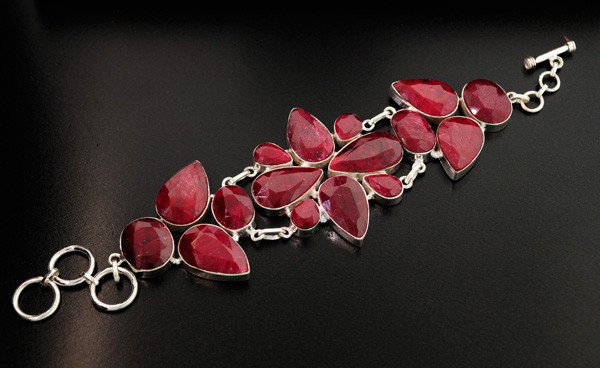 APP: 21.6k 122.17CT Ruby & Sterling Silver Bracelet: 122.17CT Ruby and Sterling Silver Bracelet - Appraisal Value: $21.6K - Bid with utmost confidence from GovernmentAuction.com. We have been in business for over 35 years, and pride ourselves on perfect
