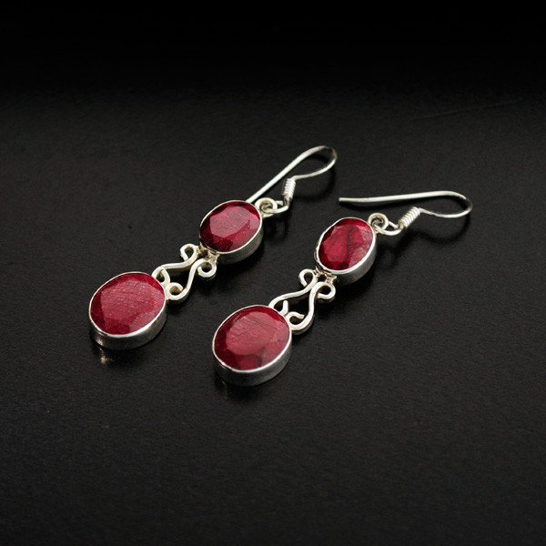 APP: 5.6k 11.69CT Ruby & Sterling Silver Earrings: 11.69CT Ruby and Sterling Silver Earrings - Appraisal Value: $5.5K - Bid with utmost confidence from GovernmentAuction.com. We have been in business for over 35 years, and pride ourselves on perfect c