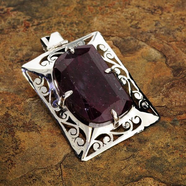 APP: 29k 107.31CT Ruby & Sterling Silver Pendant: 107.31CT Ruby and Sterling Silver Pendant - Appraisal Value: $29.0K - Bid with utmost confidence from GovernmentAuction.com. We have been in business for over 35 years, and pride ourselves on perfect 