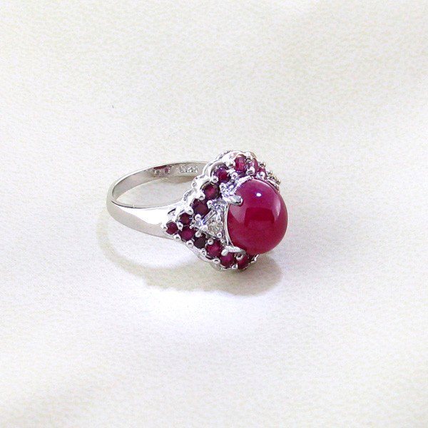 APP: 7k 6CTRuby & Platinum Overlay Sterling Silver Ring: 6.71CT Ruby and Platinum Overlay Sterling Silver Ring - Appraisal Value: $7.9K - Bid with utmost confidence from GovernmentAuction.com. We have been in business for over 35 years, and pride ourselves 