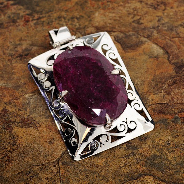 APP: 28.9k 107.34CT Ruby & Sterling Silver Pendant: 107.34CT Ruby and Sterling Silver Pendant - Appraisal Value: $28.9K - Bid with utmost confidence from GovernmentAuction.com. We have been in business for over 35 years, and pride ourselves on perfect 