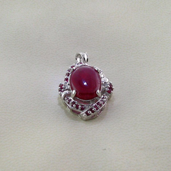 APP: 9k 6CT Ruby & Platinum Sterling Silver Pendant: 6.19CT Ruby and Platinum Overlay Sterling Silver Pendant - Appraisal Value: $9.4K - Bid with utmost confidence from GovernmentAuction.com. We have been in business for over 35 years, and pride ourselv