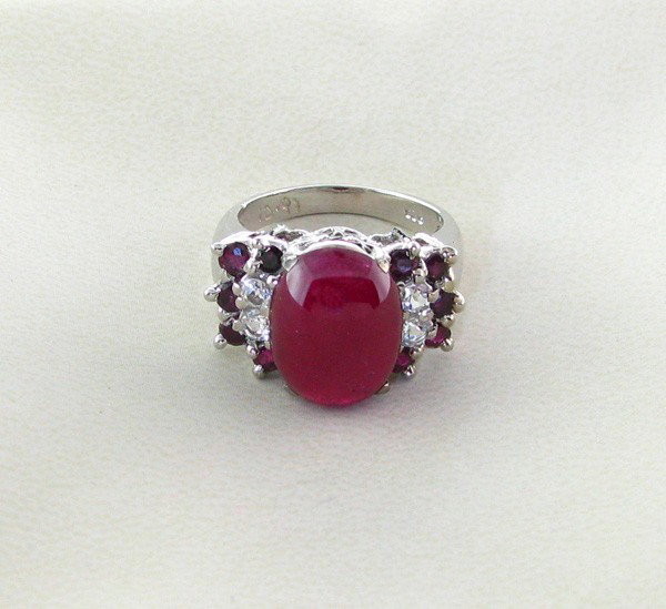 APP: 14k 10CT Ruby & Platinum Sterling Silver Ring: 10.98CT Ruby and Platinum Overlay Sterling Silver Ring - Appraisal Value: $14.6K - Bid with utmost confidence from GovernmentAuction.com. We have been in business for over 35 years, and pride ourselve