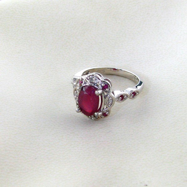 APP: 5k 2CTRuby & Platinum Overlay Sterling Silver Ring: 2.29CT Ruby and Platinum Overlay Sterling Silver Ring - Appraisal Value: $5.8K - Bid with utmost confidence from GovernmentAuction.com. We have been in business for over 35 years, and pride ourselves 