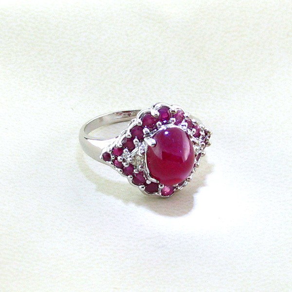 APP: 8k 6CTRuby & Platinum Overlay Sterling Silver Ring: 6.38CT Ruby and Platinum Overlay Sterling Silver Ring - Appraisal Value: $8.0K - Bid with utmost confidence from GovernmentAuction.com. We have been in business for over 35 years, and pride ourselves 