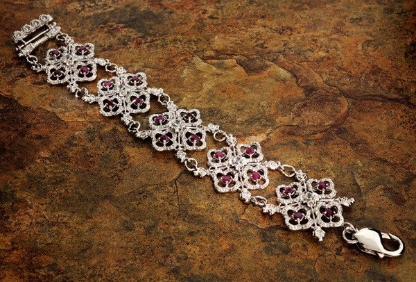 APP: 9k 5CT Ruby Platinum Sterling Silver Bracelet: 5.06CT Ruby Platinum Overlay Sterling Silver Bracelet - Appraisal Value: $9.0K - Bid with utmost confidence from GovernmentAuction.com. We have been in business for over 35 years, and pride ourselves 