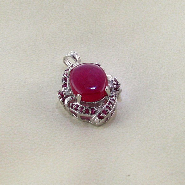 APP: 8k 7CT Ruby & Platinum Sterling Silver Pendant: 7.12CT Ruby and Platinum Overlay Sterling Silver Pendant - Appraisal Value: $8.4K - Bid with utmost confidence from GovernmentAuction.com. We have been in business for over 35 years, and pride ourselv