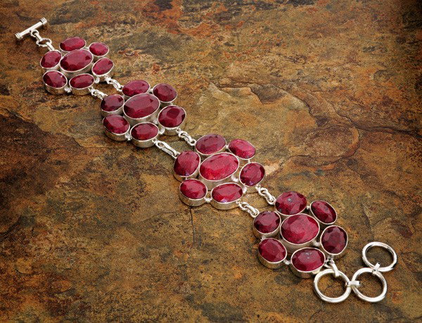 APP: 26.7k 145.16CT Ruby & Sterling Silver Bracelet: 145.16CT Ruby and Sterling Silver Bracelet - Appraisal Value: $26.7K - Bid with utmost confidence from GovernmentAuction.com. We have been in business for over 35 years, and pride ourselves on perfect