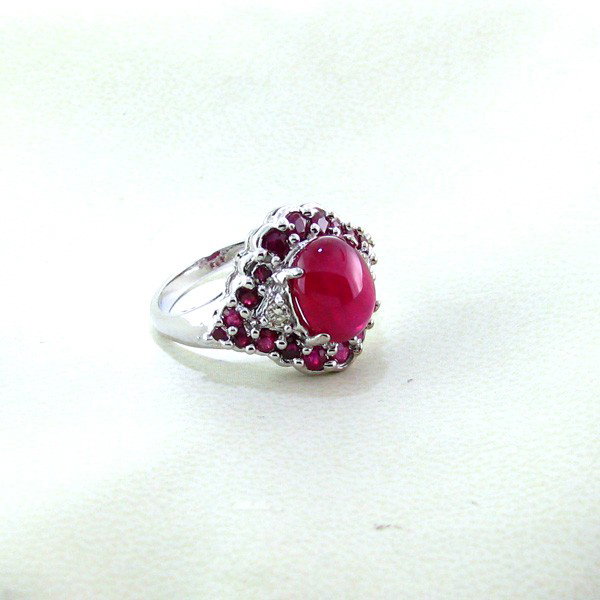 APP: 7k 5CTRuby & Platinum Overlay Sterling Silver Ring: 5.59CT Ruby and Platinum Overlay Sterling Silver Ring - Appraisal Value: $7.8K - Bid with utmost confidence from GovernmentAuction.com. We have been in business for over 35 years, and pride ourselves 