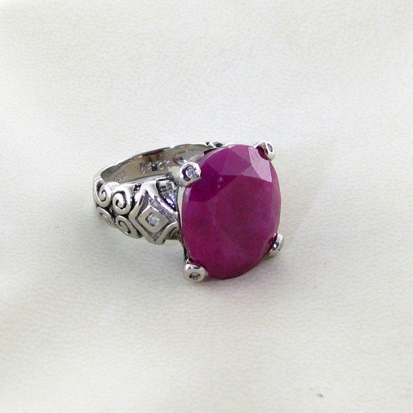 APP: 10k 19CT Ruby w/Diamonds & Plat Sterl Silver Ring: 19.99CT Ruby W/Diamonds and Platinum Overlay Sterling Silver Ring - Appraisal Value: $10.7K - Bid with utmost confidence from GovernmentAuction.com. We have been in business for over 35 years, and pri