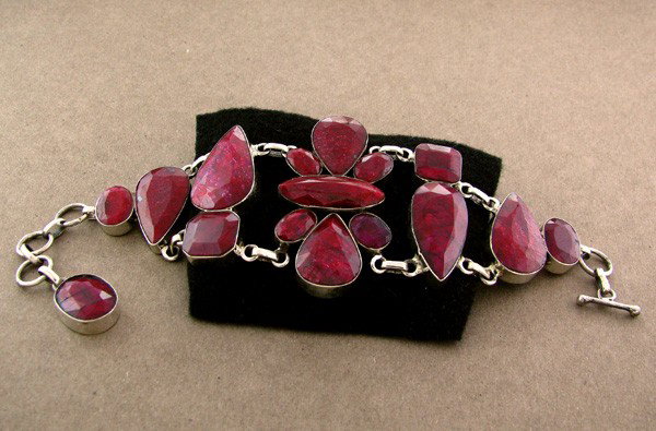 APP: 20.4k 114.77CT Ruby & Sterling Silver Bracelet: 114.77CT Ruby and Sterling Silver Bracelet - Appraisal Value: $20.3K - Bid with utmost confidence from GovernmentAuction.com. We have been in business for over 35 years, and pride ourselves on perfect