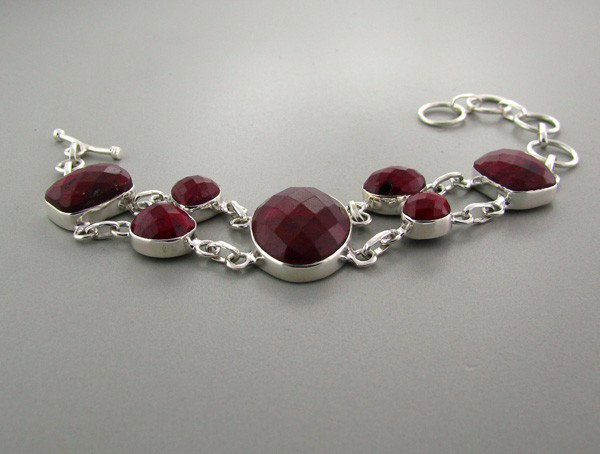 APP: 22.5k 82.33CT Ruby & Sterling Silver Bracelet: 82.33CT Ruby and Sterling Silver Bracelet - Appraisal Value: $22.5K - Bid with utmost confidence from GovernmentAuction.com. We have been in business for over 35 years, and pride ourselves on perfect 